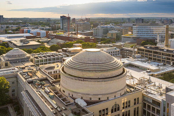 Arial view of teh MIT building 10 dome with the campus skyline in the background